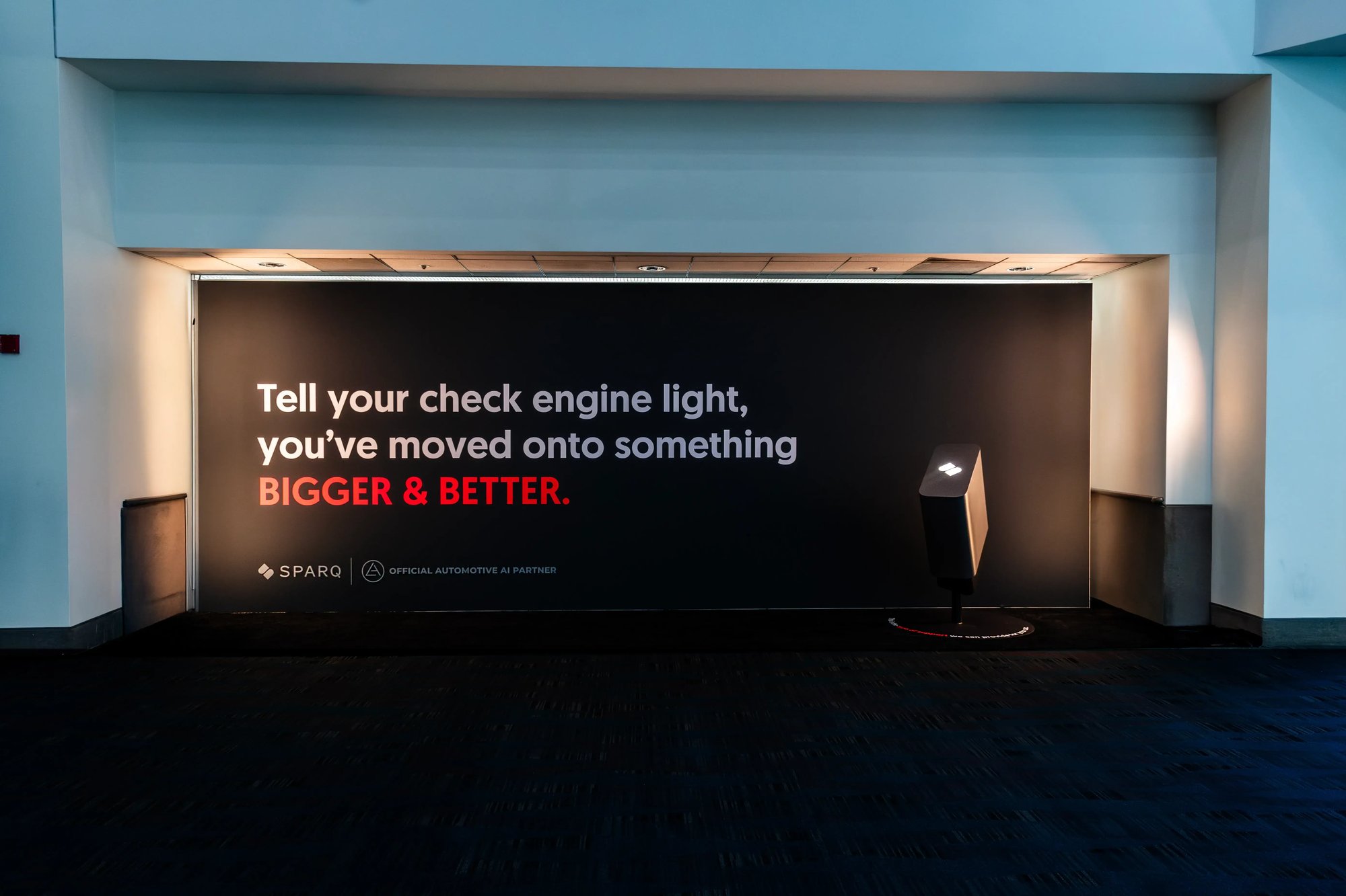 Sparq-LA Autoshow-wall-with-sculpture